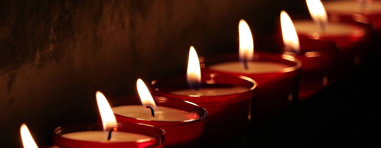 row of tea lights and indian diyas