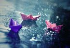 paper boats in rain