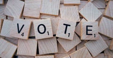 scrabble tiles vote