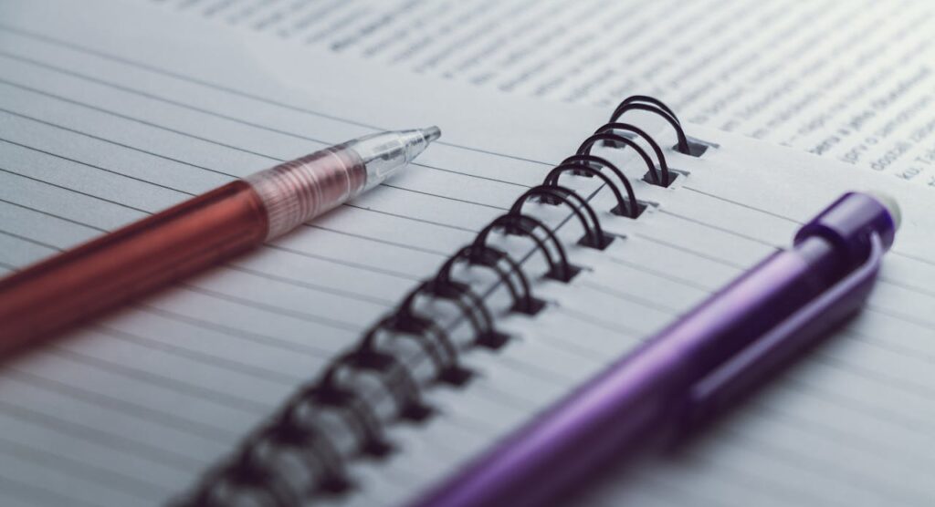 pen pencil and notebook