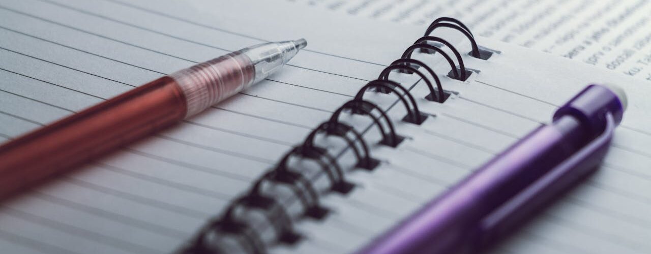 pen pencil and notebook