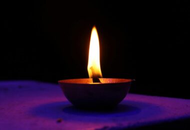 Oil lamp made of clay on a wall